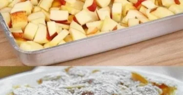 Apfelkuchen mit Vanillepudding auf einem Teller garniert mit Äpfeln