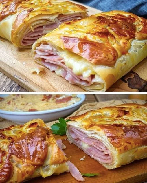 Blätterteigstrudel mit Schinken und Käse auf einem Teller serviert