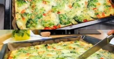 Leckere Brokkoli-Pizza mit frischem Gemüse und glutenfreiem Boden.