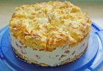 Himbeer-Baiser-Torte mit frischen Himbeeren und Baiser-Topping