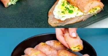 Hühnchen-Käse-Rollen auf einem Teller garniert mit frischen Kräutern.