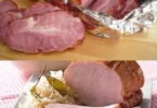 Kasseler Lendenbraten serviert mit Beilagen auf einem Teller
