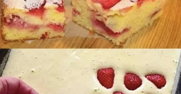 Obstkuchen mit frischen Erdbeeren, Bananen und Mandarinen auf einem Teller