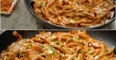 Schweineschnitzel serviert mit Paprikasauce und Basmati-Reis auf einem Teller