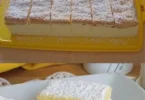 Leckere Zitronenschnitten auf einem Teller, ideal für Kaffee und Gebäck