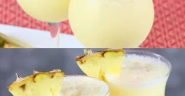 Ananas-Kokoscreme-Dessert in einer eleganten Schale serviert, dekoriert mit frischen Ananasscheiben.