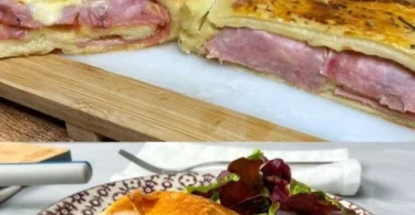 Blätterteig Strudel gefüllt mit Schinken und Käse auf einem Holzbrett