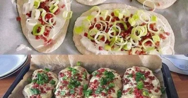 Fladenbrot mit Frischkäse und knusprigem Speck auf einem Teller