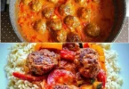 Fleischbällchen in Ajvar und Sahnesoße serviert auf einem Teller