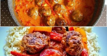 Fleischbällchen in Ajvar und Sahnesoße serviert auf einem Teller