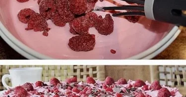 Delikater Himbeer-Cheesecake mit frischen Himbeeren und cremigem Käse