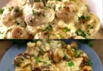 Knoblauchchampignons mit Parmesan-Käse auf einem Teller serviert.