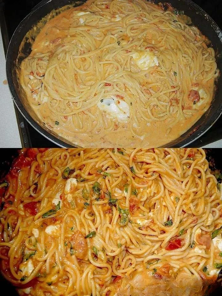 Mozzarella-Spaghetti mit frischem Basilikum und Tomatensauce