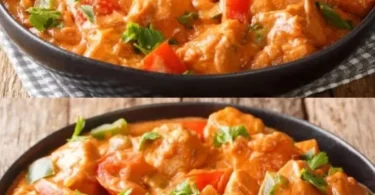 Leckeres Paprika-Sahne-Hähnchen mit frischen Paprikaschoten auf einem Teller serviert.