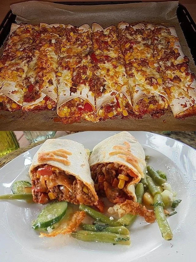 Leckere Burritos mit Hackfleisch und Käse serviert auf einem Teller