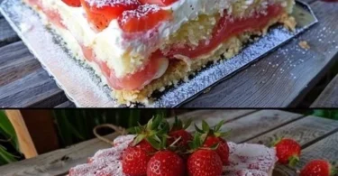 Leckerer Erdbeer Kuchen mit frischen Erdbeeren und Sahne