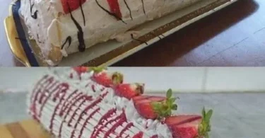 Erdbeer-Swiss-Rolle mit frischen Erdbeeren und Sahne, auf einem Teller serviert.