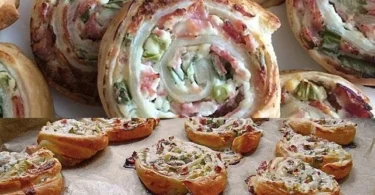 Leckeres Flammkuchen Roll serviert auf einem Holzbrett.