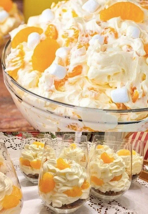 Leckeres Mandarinen-Schichtdessert in einer Glasschale.