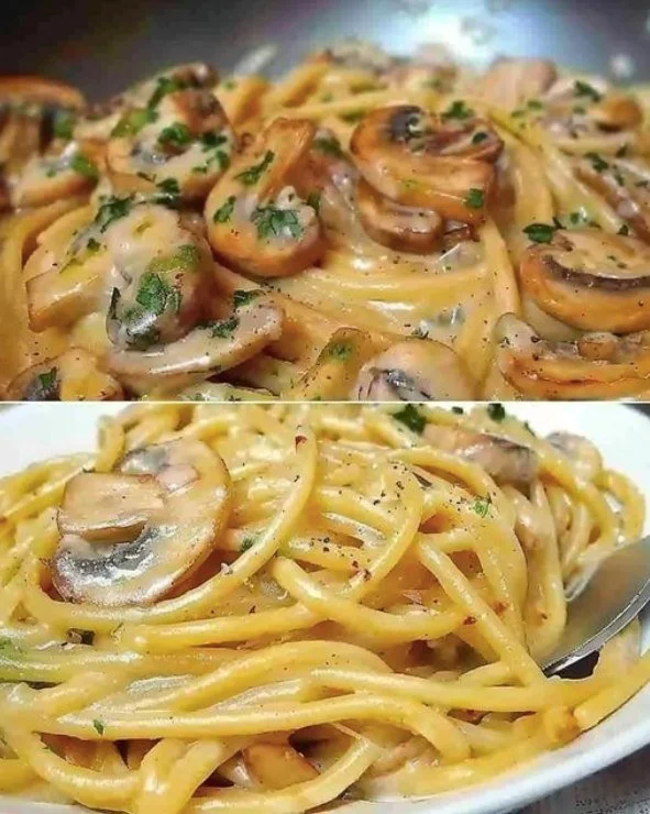 Pasta mit Pilzen und cremiger Sahnesauce auf einem Teller