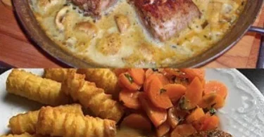 Schweinefilet mit cremiger Pilzsauce auf einem Teller