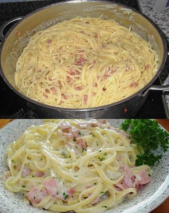 Eine Portion Spaghetti alla Carbonara mit Speck und Parmesan auf einem Teller