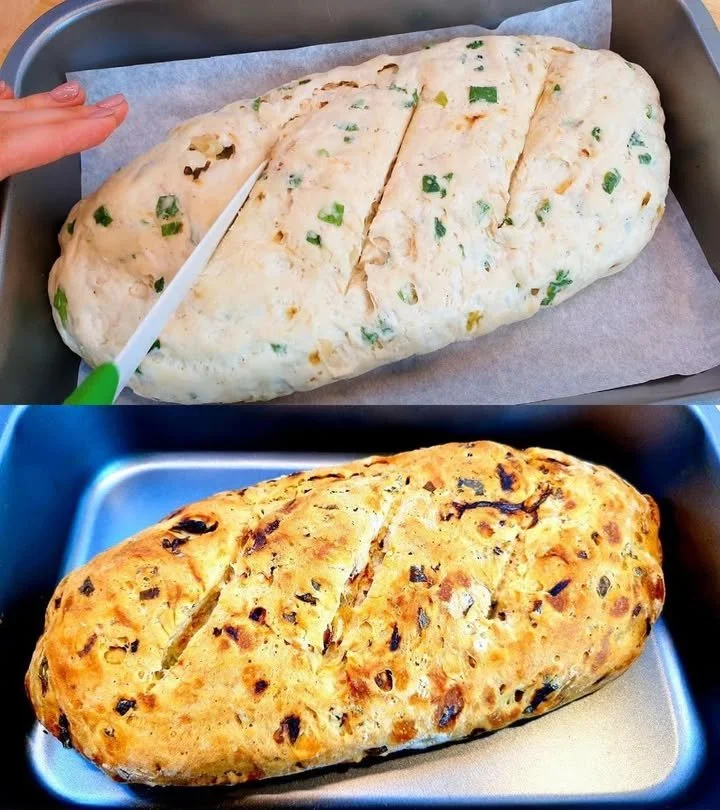 Frisches Speltbrot auf einem Holzbrett, perfekt für gesunde Ernährung.