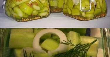 Glas mit süßsaure Senfgurken auf einem Tisch, ideal für Salate oder Snacks