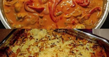 Überbackenes Schnitzel mit Pilzen und Paprika auf einem Teller