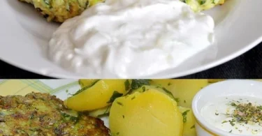 Zucchini Fritter mit Feta und Tzatziki auf einem Teller angerichtet