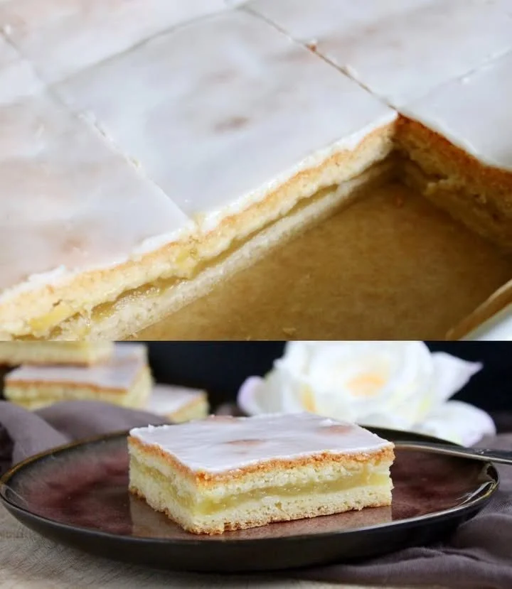 Leckerer Apfelkuchen mit Glasur auf einem Holztablett serviert