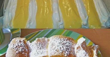 Biskuit-Rollenschnitten gefüllt mit Aprikosenmarmelade auf einem Teller