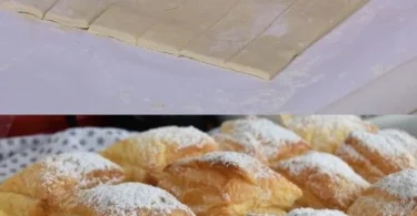 Blätterteigstück gefüllt mit Vanillecreme auf einem Teller