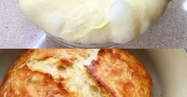 Dinkel- und Weizenbrot ohne Aufgehen, frisch gebacken auf einem Holztisch