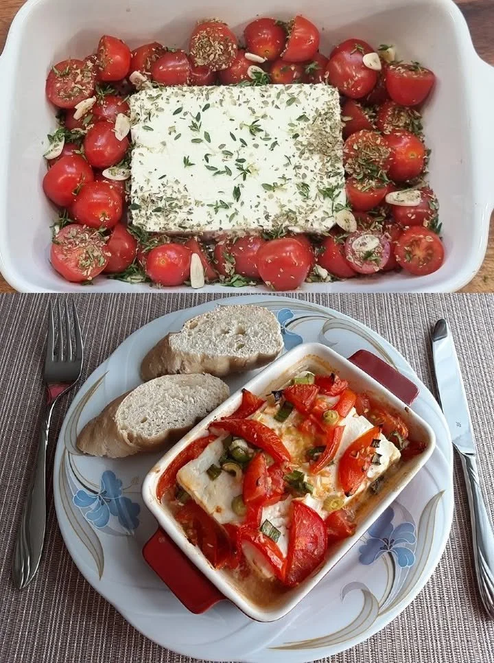 Einfach gebackener Feta mit Kräutern und Tomaten auf einem Teller.