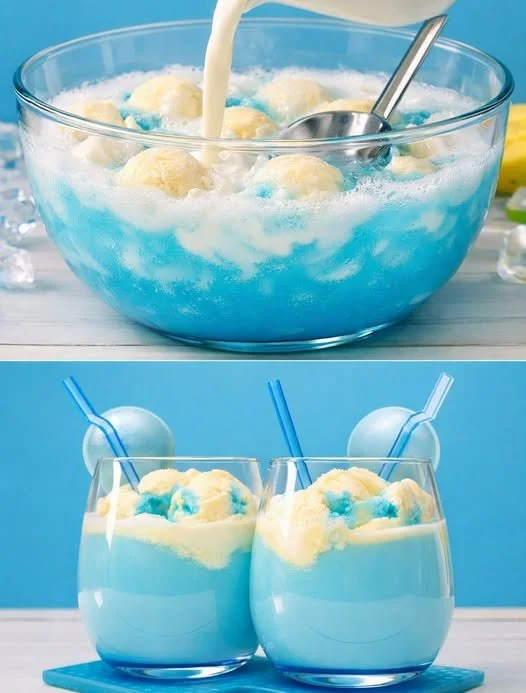 Eis Königin Cocktail in einem eleganten Glas mit Eiswürfeln und frischen Früchten