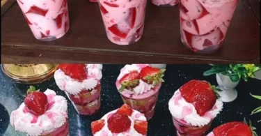 Erdbeer-Joghurt-Creme in einer Schüssel, dekoriert mit frischen Erdbeeren
