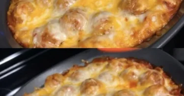 Leckere Fleischbällchen mit Kartoffeln und Käse auf einem Teller serviert.