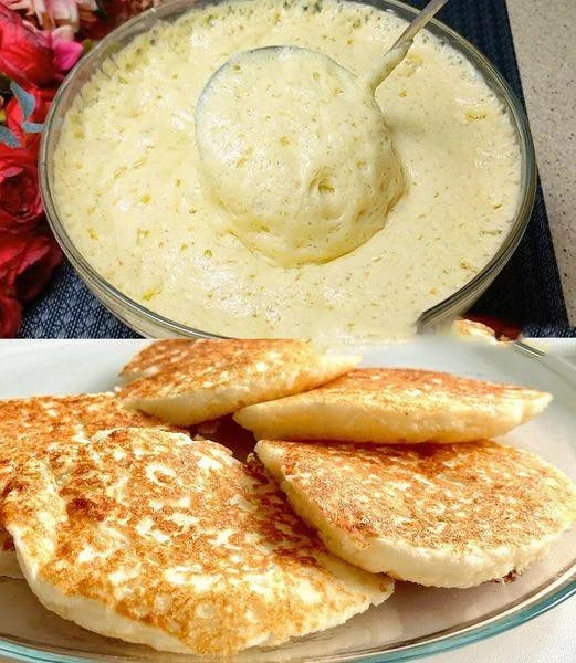 Hefepfannkuchen mit Apfel auf einem Teller, frisch gebacken und serviert.