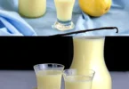 Köstlicher Limoncello mit Sahne in einem eleganten Glas serviert.