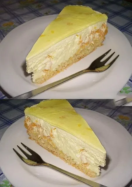 Paradiescreme Kuchen mit Mandarinen auf einem Teller serviert