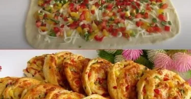 Leckere Puff Pastry Rolls mit Schinken und Käse auf einem Teller