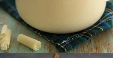 Bild von Schokoladenmilch in einem Glas mit Schokoladenstückchen