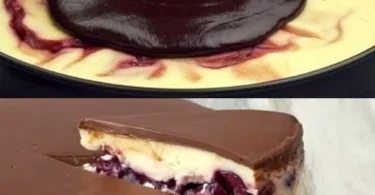 Schwarzwälder-Käse-Torte mit Schokolade und Kirschen auf einem eleganten Teller