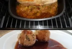 Leckeres Schweinebraten mit Sauerkraut auf einem Teller serviert.