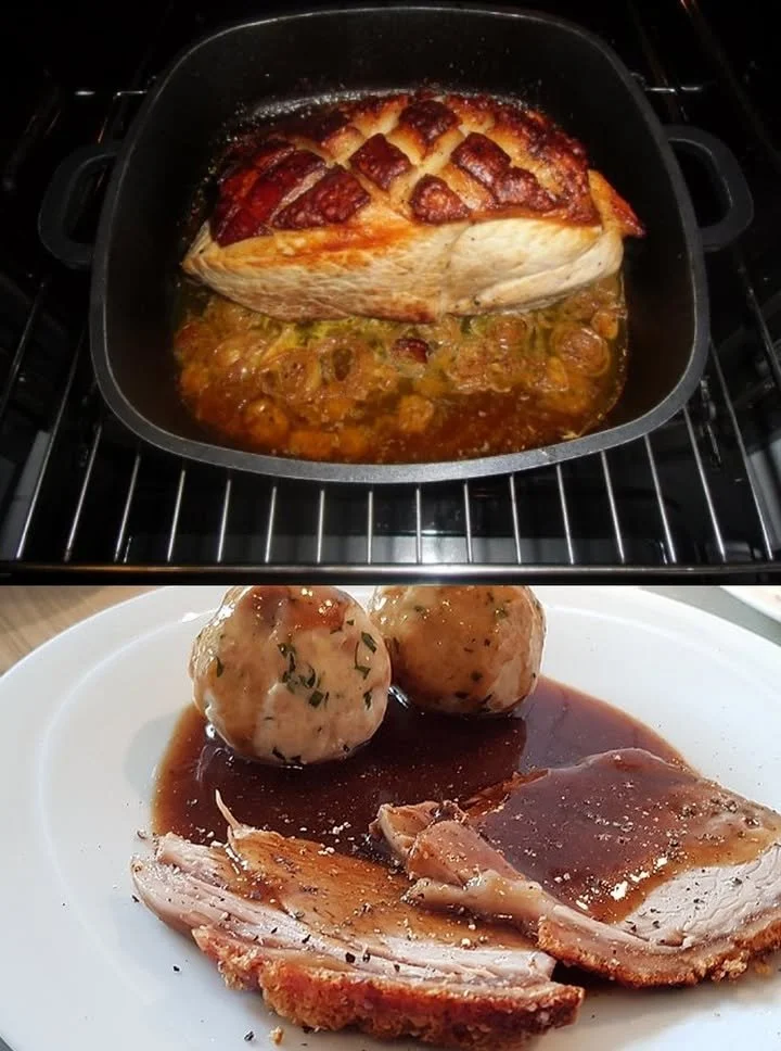 Leckeres Schweinebraten mit Sauerkraut auf einem Teller serviert.