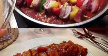 Leckeres Shashlik mit hausgemachter Shashlik-Sauce auf dem Grill.