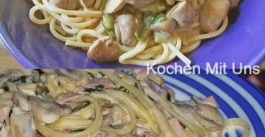 Spaghetti mit Pilz-Parmesan-Sauce auf einem Teller serviert