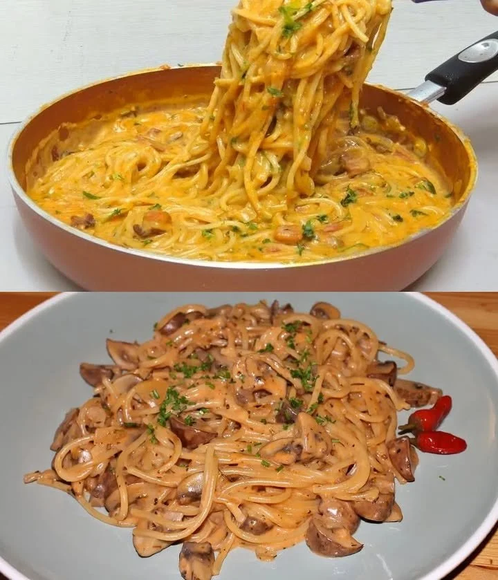Spaghetti mit cremiger Pilzsahnesauce auf einem Teller angerichtet