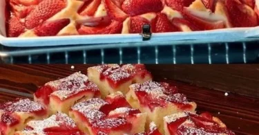 Gesunkener Erdbeer-Blattkuchen in einer Kastenform mit frischen Erdbeeren dekoriert